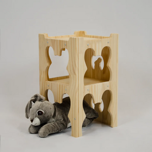 rabbit laying in a wooden castle tower