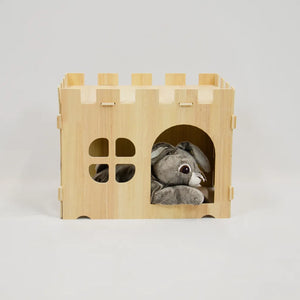 rabbit in wooden castle house