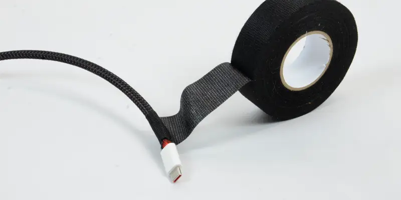 cable tape with protector around cable