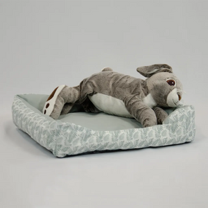 bunny laying on zolux bunny bed