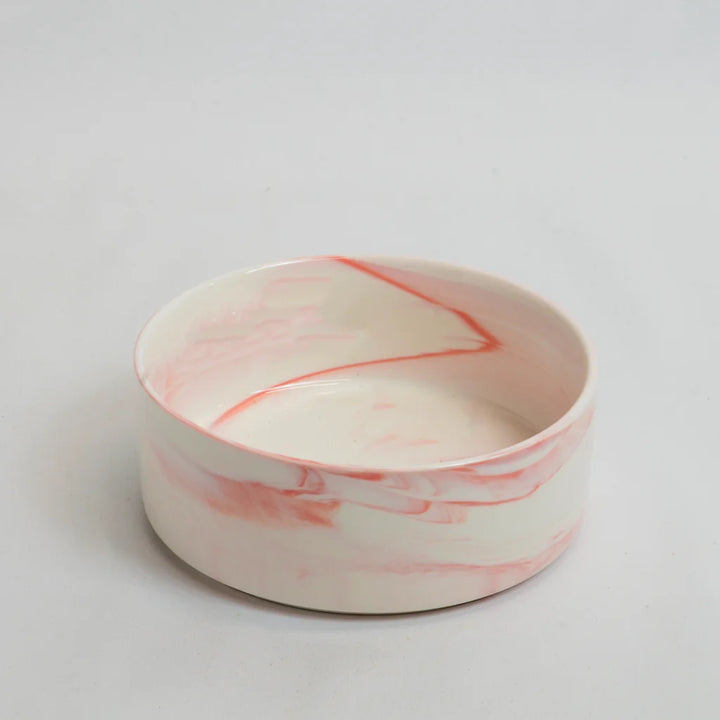 One pink marble-look drinking bowl for rabbits 