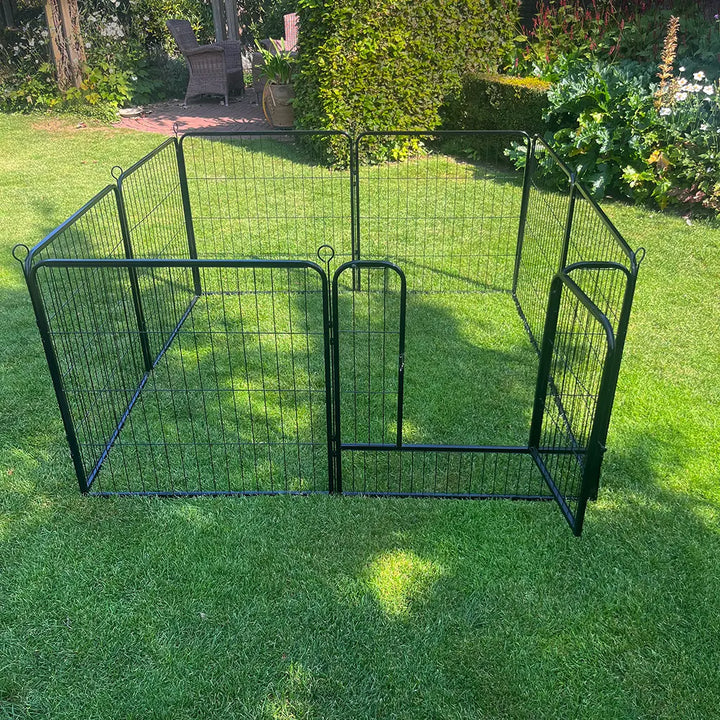 Square Metal Rabbit Playpen Outside on grass