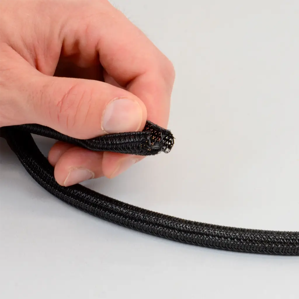 Easy installation of self closing cable protector 