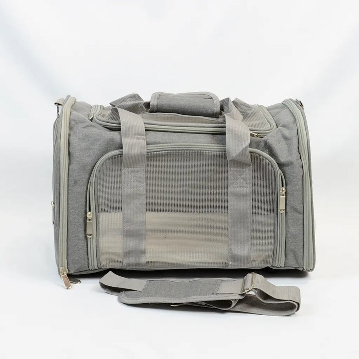 Grey travel carrier for rabbits with shoulder band